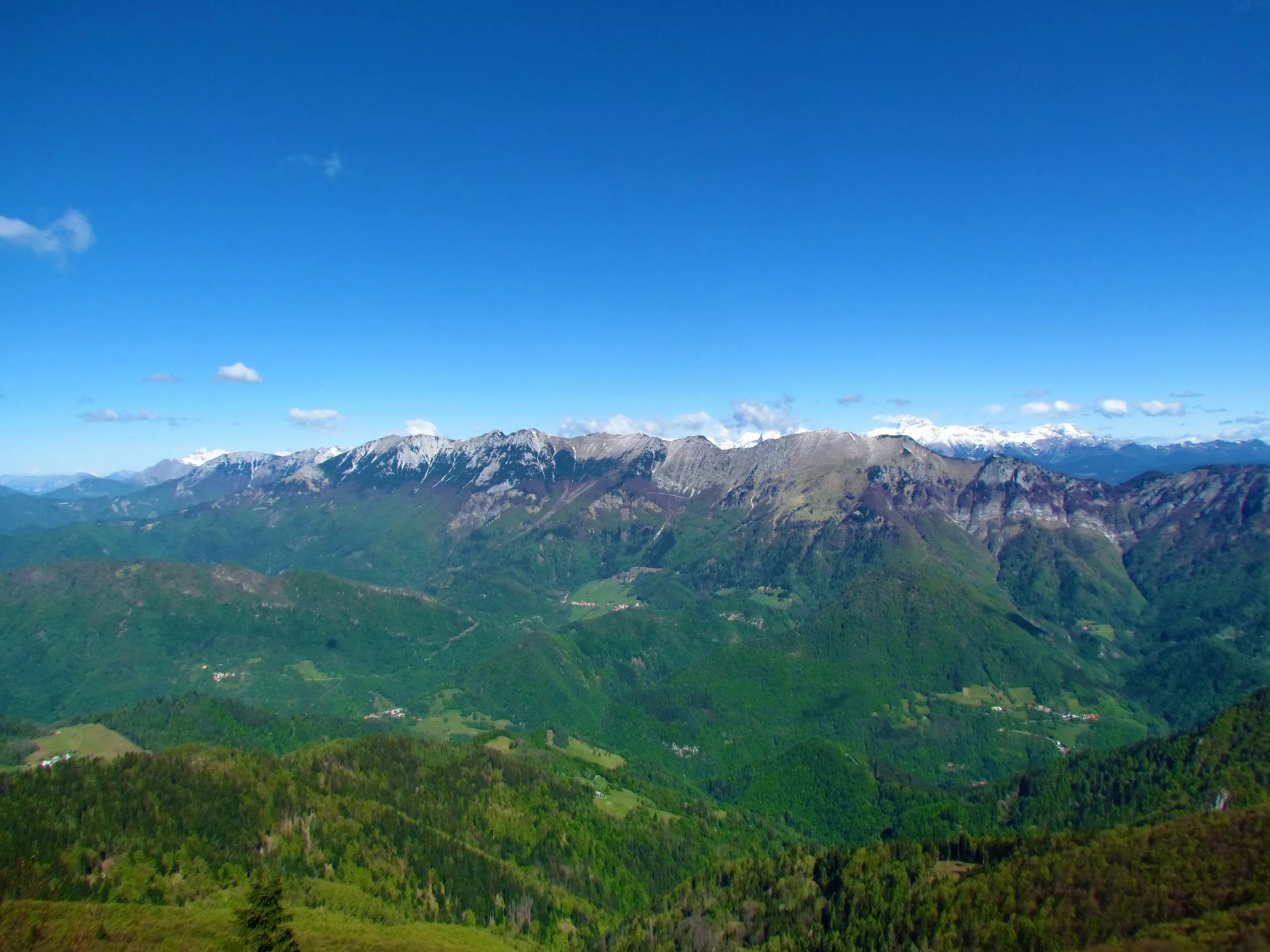 View of a mountain range in Julian alps in Gorenjska, Slovenia above Baska Grapa